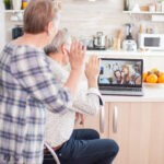 Greeting family during video call