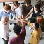 photo-of-people-holding-each-other-s-hands-3184423